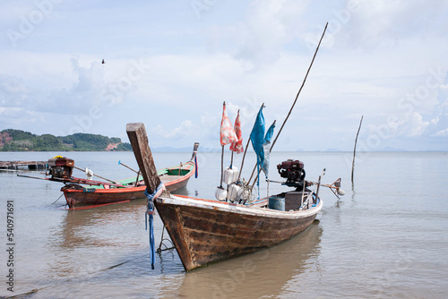 Small fishing boats moored by the sea