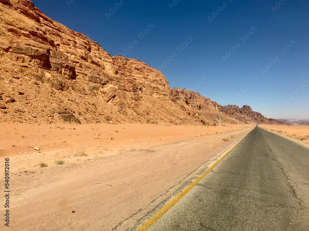 Wadi Rum, Jordan, November 2019 - A close up of a desert road