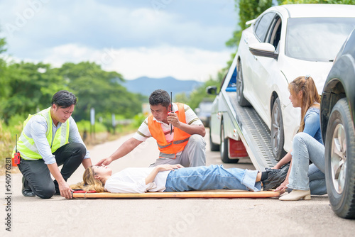 An injured woman in a plastic stretcher after a car accident ,Car accident insurance concept