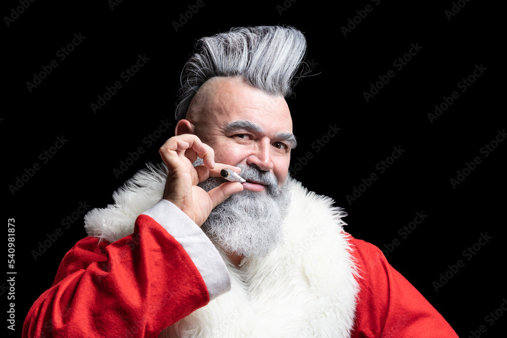 Tobacco smoking crazy Santa claus with mohawk. New Year and Christmas in the company of an unusual bad Santa. Dangerous gray-haired old man Santa Tobacco smoking crazy Santa claus with mohawk. New Year and Christmas in the company of an unusual bad Santa. Dangerous gray-haired old man Santa