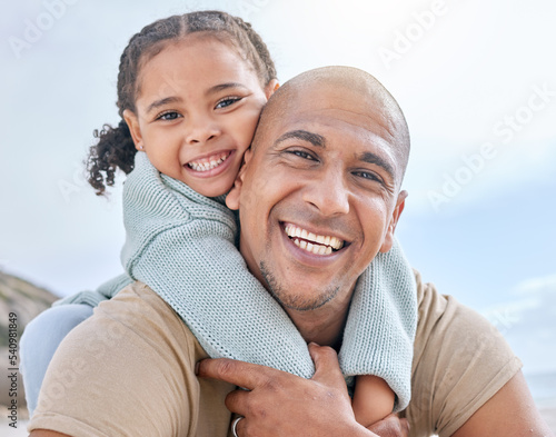 Happy, father and child hug with smile for family quality bonding time together in the outdoors. Portrait of dad and kid piggyback smiling in joyful happiness for carefree summer vacation in nature photo
