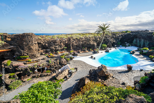 Amazing cave, pool, natural auditorium, salty lake designed by Cesar Manrique in volcanic tunnel called Jameos del Agua in Lanzarote, Spain photo