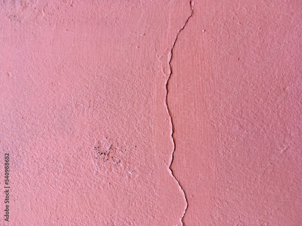 Obraz premium Pink crack wall background