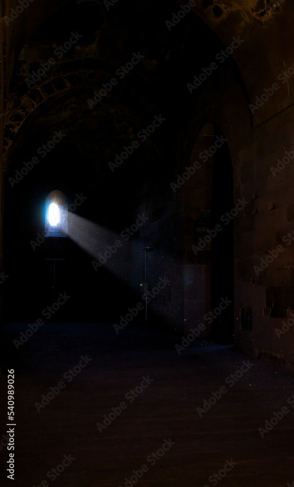Fototapeta premium light at the end, tunnel of light, tunnel in the night, beam of light, light in the dark, light in the historic site
