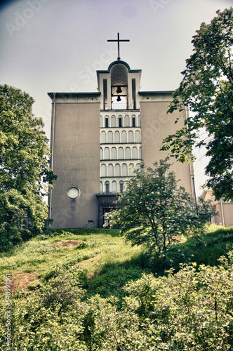 Helsinki, Finland, February 2018 - A small clock tower in front of a house