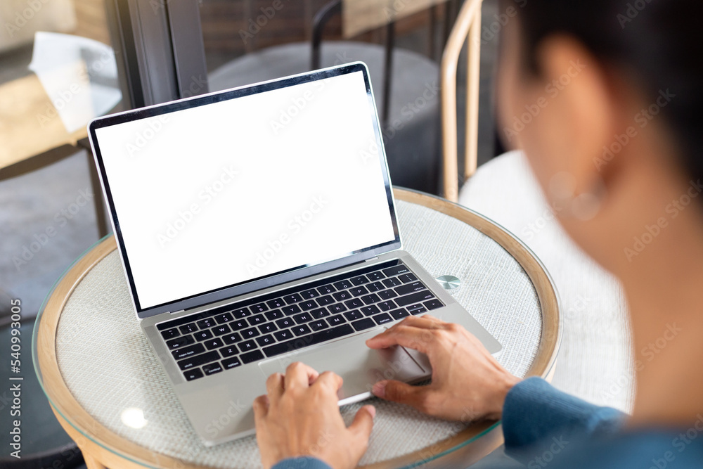 computer screen blank mockup.hand woman work using laptop with white background for advertising,contact business search information on desk at coffee shop.marketing and creative design computer screen blank mockup.hand woman work using laptop with white background for advertising,contact business search information on desk at coffee shop.marketing and creative design