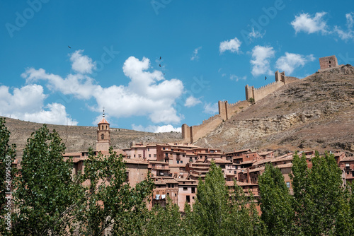Panoramic view of the town of Albarracin in Teruel (Spain), with the town in the foreground and the medieval walls on top of the hill.