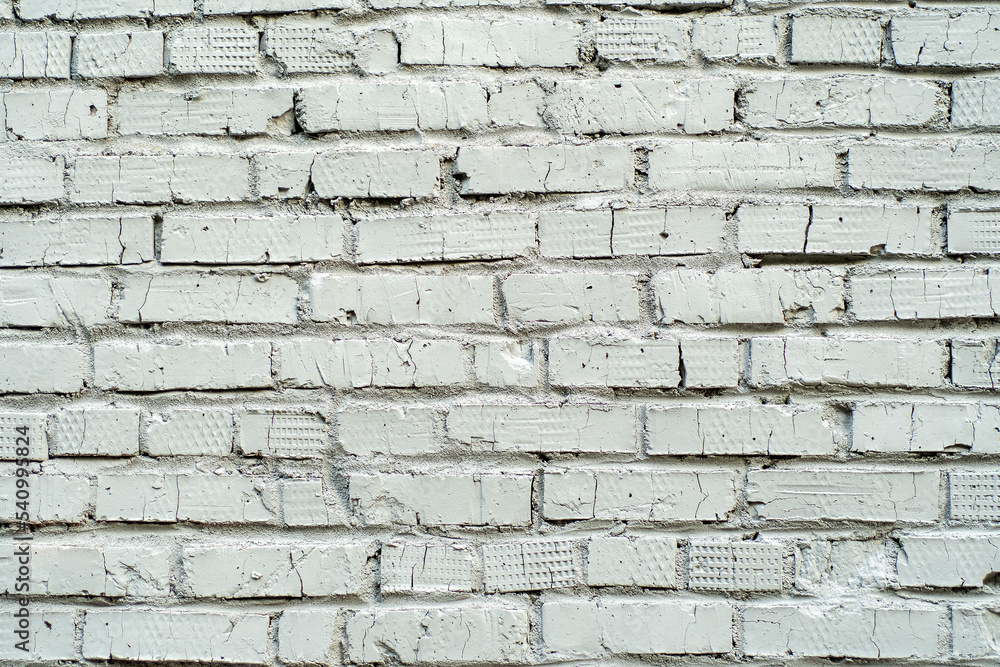Wall of white bricks. Background with wall painted with white paint. Wall of white bricks. Background with wall painted with white paint.
