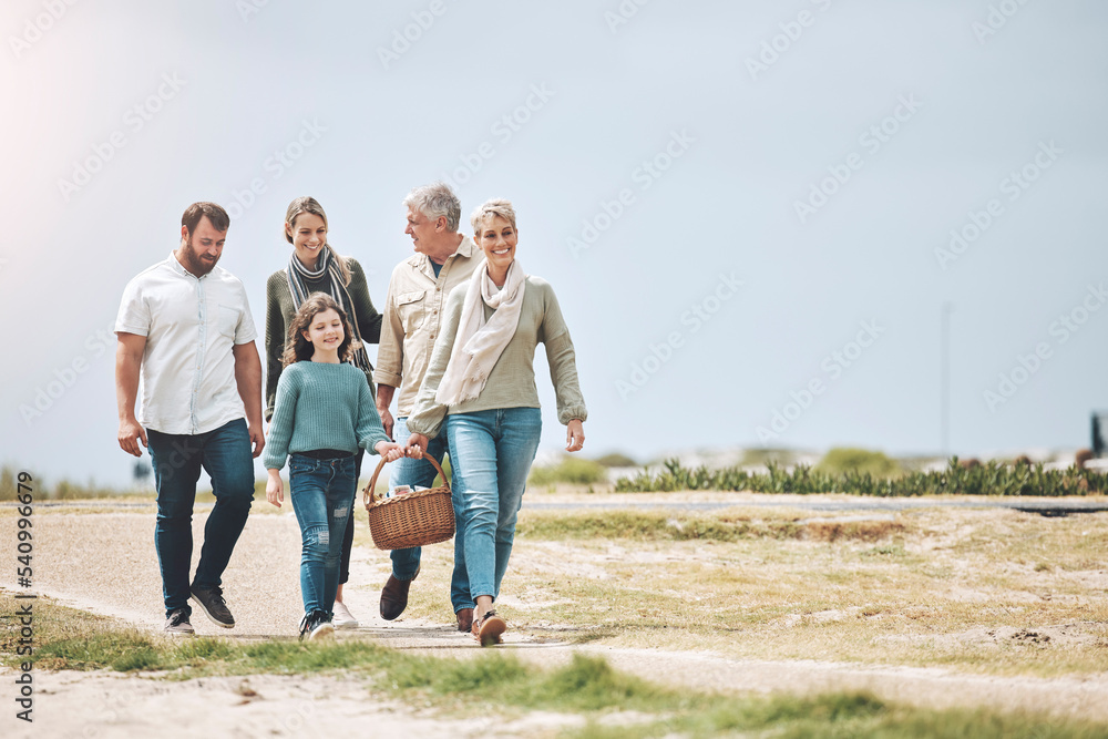 Big family, happy and walking for a picnic on holiday, vacation or ...