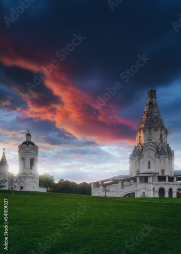 Church of the Ascension in Kolomenskoye Park at dramatic sky in the sunset. Moscow, Russia. Famous place and tourist attraction