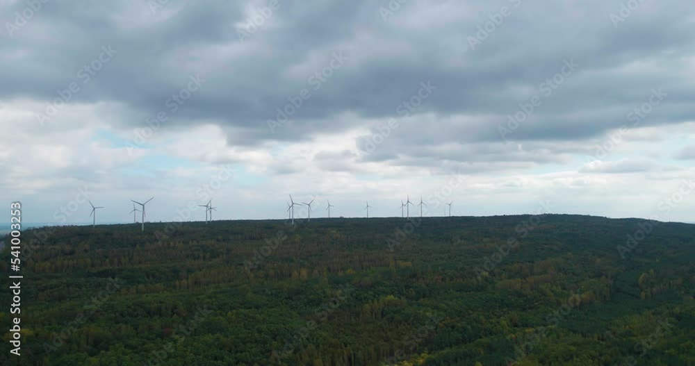 power generating wind turbines in the countryside (aerial) power generating wind turbines in the countryside (aerial)