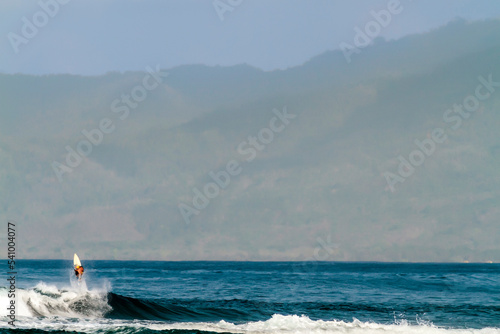 Surfer on wave, Lakey Peak, Central Sumbawa, Indonesia photo