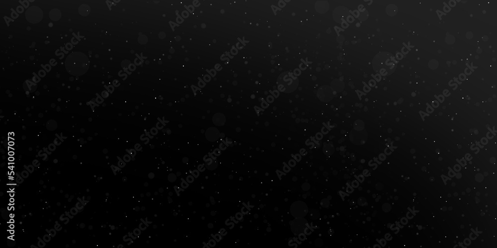 Obraz premium Falling snow isolated on black background