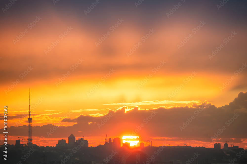 Sunset in the city with silhouette of buildings