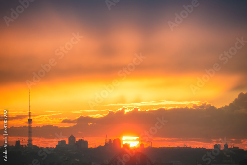 Sunset in the city with silhouette of buildings