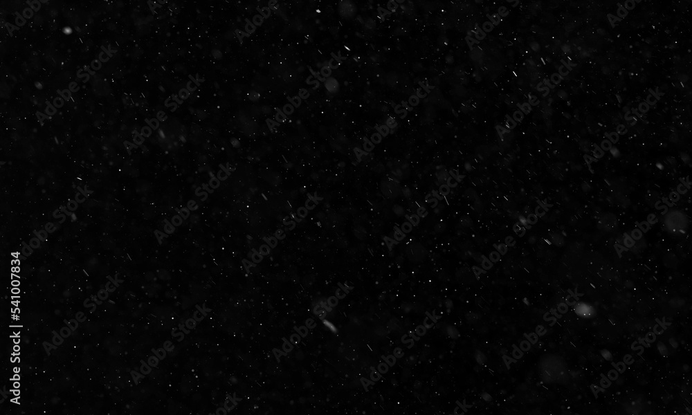 Fototapeta premium Falling snow isolated on black background