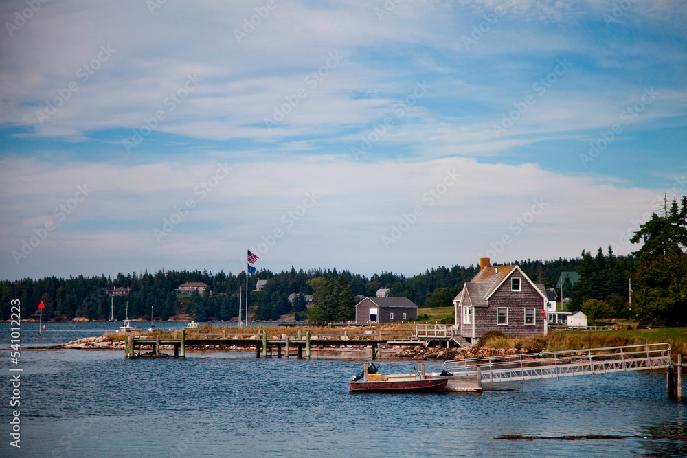 The calm inlet waters off the coast of Isle Au Haut on a sunny afternoon. The calm inlet waters off the coast of Isle Au Haut on a sunny afternoon.