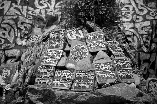 Mani stones etched with Buddhist prayers line the trails in Nepal's Khumbu region. photo