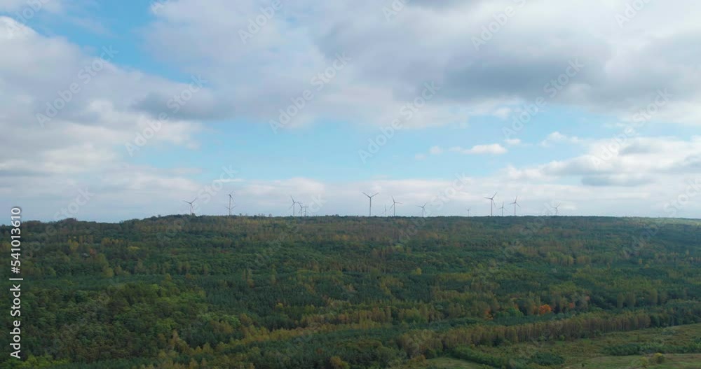 power generating wind turbines in the countryside (aerial) power generating wind turbines in the countryside (aerial)