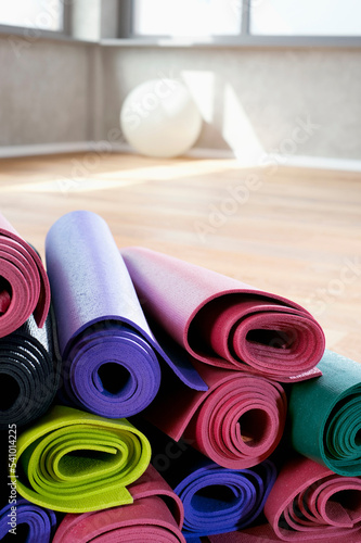Close up Pile of colorful Yoga mats photo