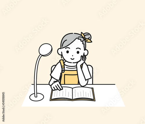 読書をする小学生の女の子のイラスト