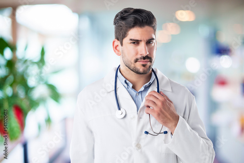 Male doctor standing in clinic