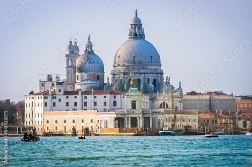 Cathedral of Santa Maria della Salute cathedral church (chiesa) in Venice on the Grand Canal in the Dorsoduro region, Italy. Sunny day, blue sky. photo