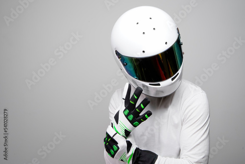 Fotótapéta Professional Male Driver with Helmet and Gloves
