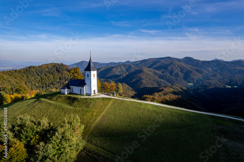 The Church of St. Primož and Felicijan, Jamnik, Slovenia, sunset drone photo