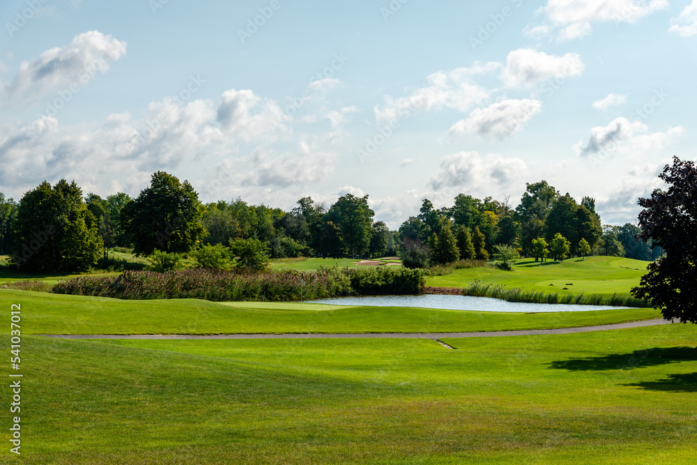 Golf field on the warm autumn day