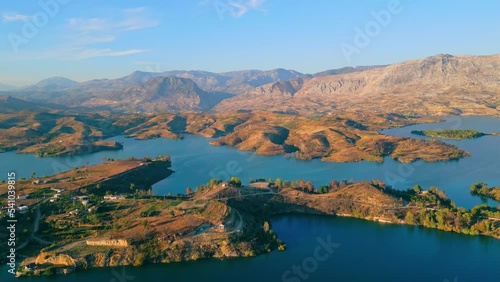 Stunning mountains cape of Manavgat Baraji in Turkey. Soft sunrise lighting illuminating wild hills. Drone perspective. High quality 4k footage photo