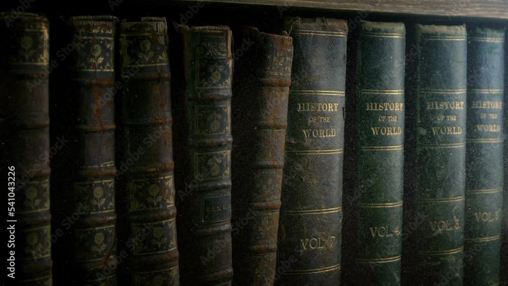 Passing Old Leather Bound Books In Dusty Library
Passing Old Leather Bound Books In Dusty Library
