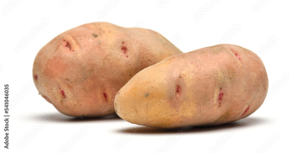 raw potatoes close up, objects are isolated on a white background raw potatoes close up, objects are isolated on a white background