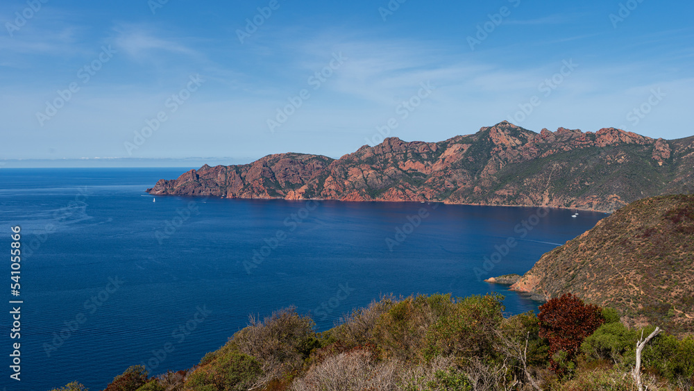 View from famous D81 coastal road with view of Gulf de Girolata from Bocca di Palmarella, Corsica, France, Europe