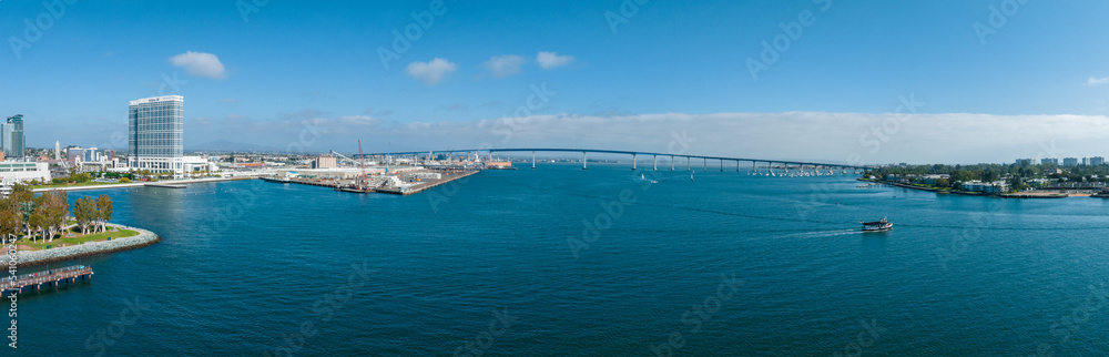 Panorama aerial view of Coronado Bridge with San Diego skyline, USA.