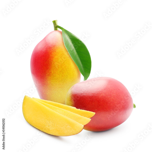 Two fresh whole mango fruits and juicy slices isolated on white background 