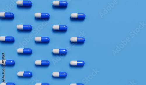 medical pill capsules on a blue background. Healthcare concept. 3D Rendering