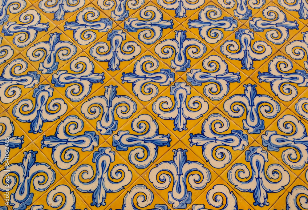Yellow tiles with blue floral decoration