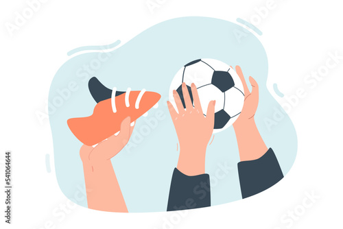 Fototapeta Naklejka Na Ścianę i Meble -  Hands holding football ball and boots flat vector illustration. Uniform, soccer boots for football player on blue background. Sports game, physical activity, training concept