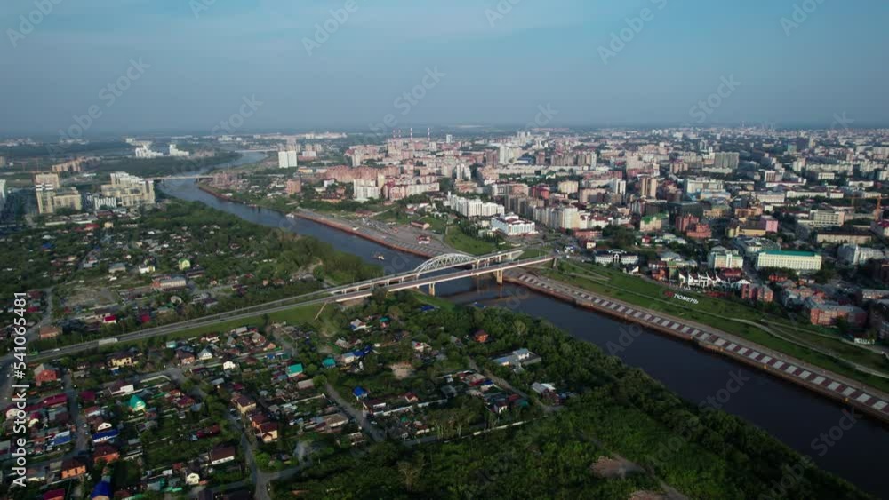 Tyumen, Russia - July 25 2022: City and river Tyumen, Russia - July 25 2022: City and river