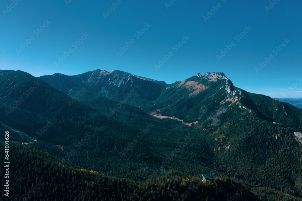 Obraz premium mountain landscape, Tatra mountains panorama, Poland. Tatra National Park. Panorama of the surrounding area Swinica, Tatra Mountains. Zakopane town in Poland. panorama from peak - Slovakia Tatras.