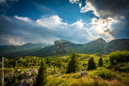 Looming thunderclouds create a beautiful evening atmosphere in the Dolomites. Falzarego pass  Dolomites  South Tirol  Italy  Europe.