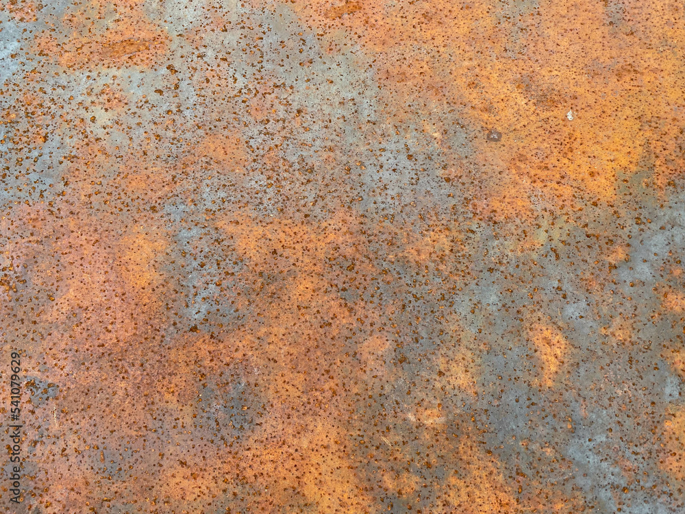 Rusty old iron red scratched metal corrosed sheet surface background, texture industrial in loft style