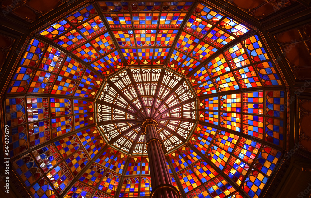 Overhead stained-glass arched ceiling oval