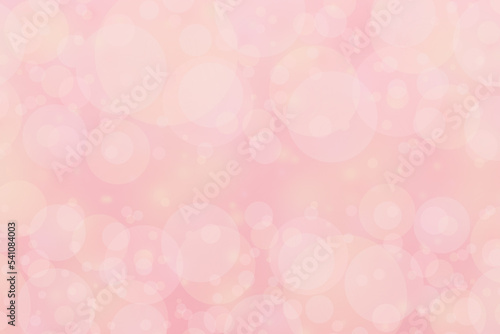 pastel pink background with blur bokeh lights and free space for text © Iveta