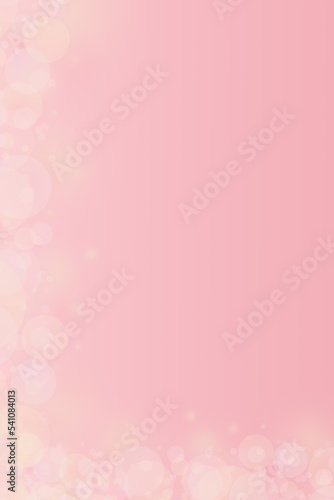 pastel pink background with blur bokeh lights and free space for text