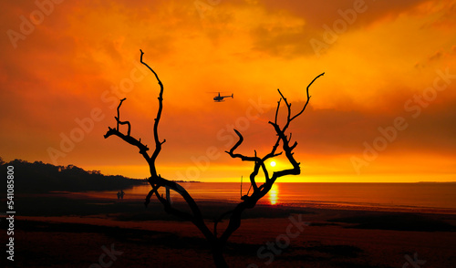 Sunset at Weipa with helicopter in the background