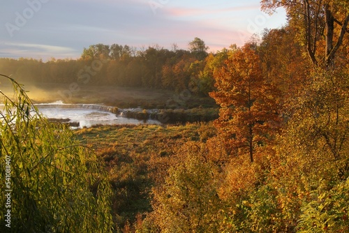 Morning View of the Rumba Falls. Autumn landscape. Kuldiga, Latvia. Selective focus.