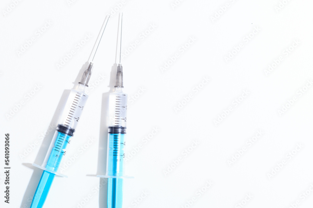 Disposable plastic syringe prepared for injection and vaccination in the hospital. The concept of medicine and health Disposable plastic syringe prepared for injection and vaccination in the hospital. The concept of medicine and health