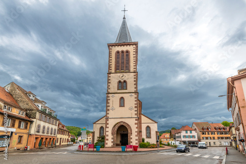 The Église Saint-Léger Catholic Church in the old town center of Munster, France, in the Alsace region. photo